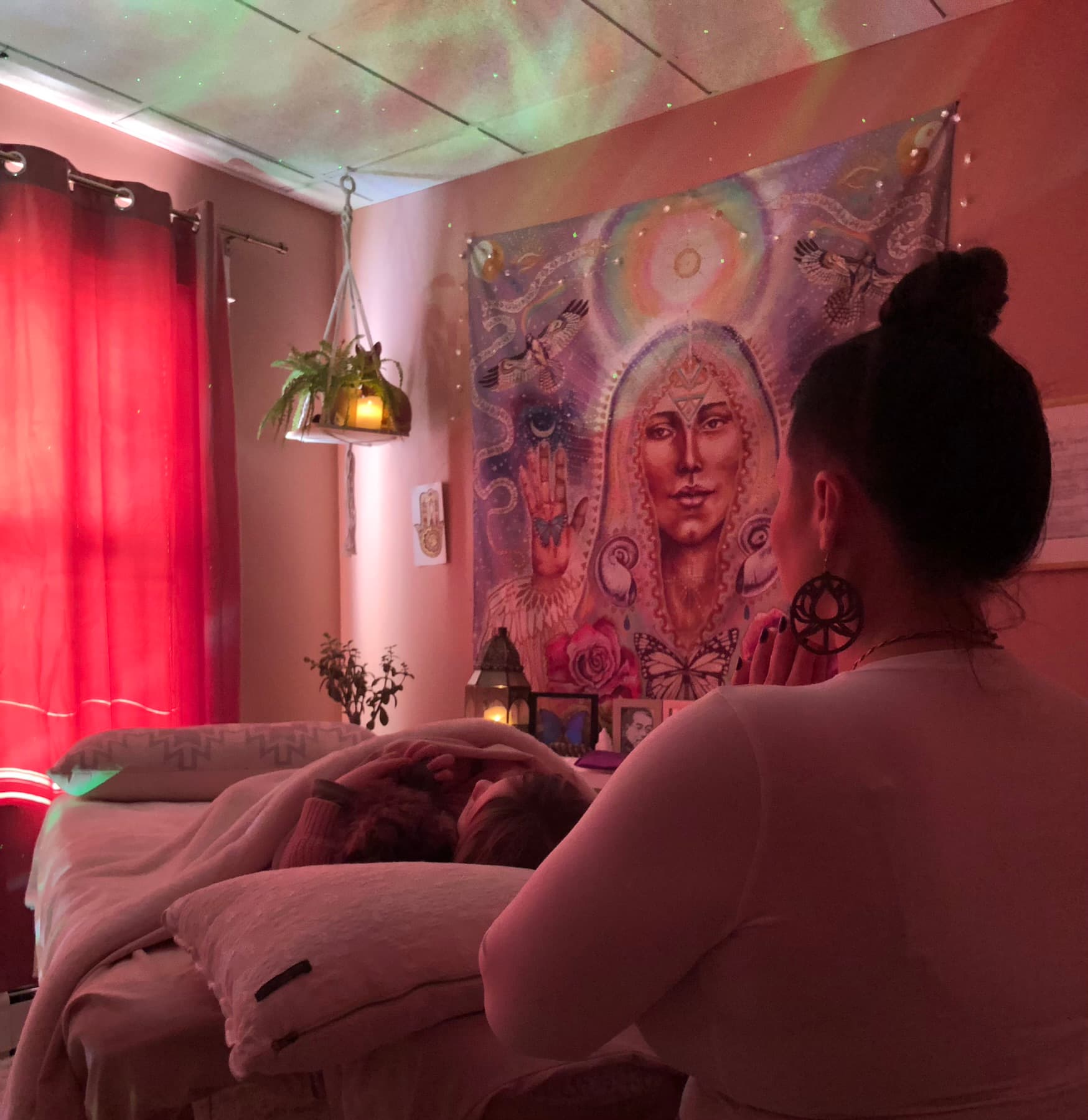 Kate offering a healing session in her practice space
